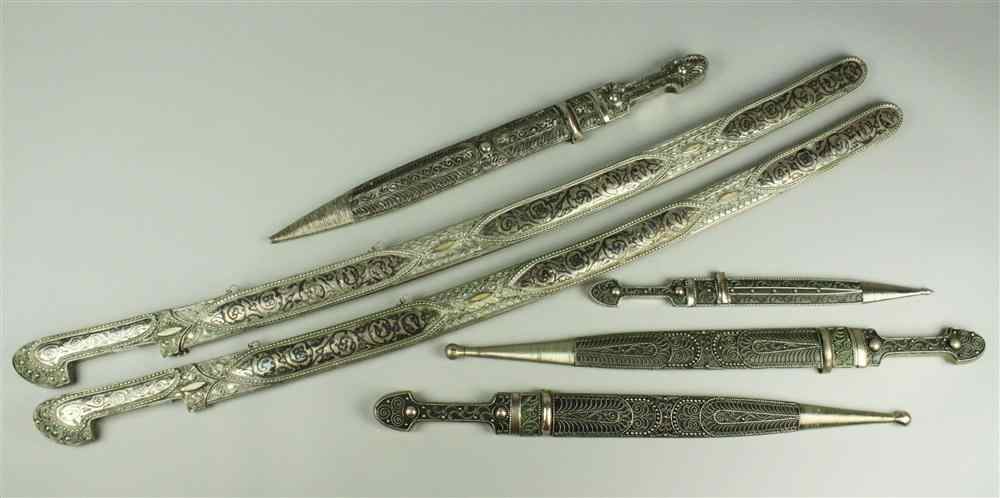 Appraisal: SIX RUSSIAN STYLE EDGED WEAPONS WITH SCABBARDS With two Caucasian