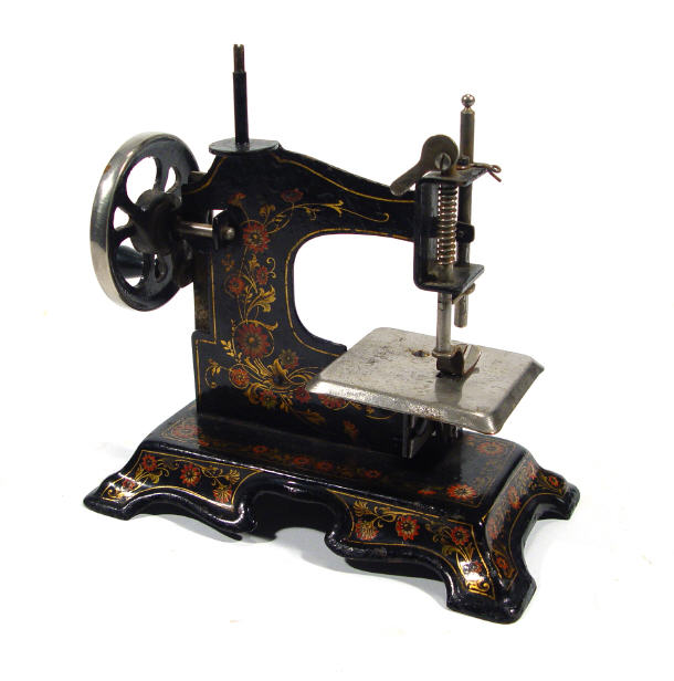 Appraisal: Small Victorian sewing machine decorated with gilt and red flowers