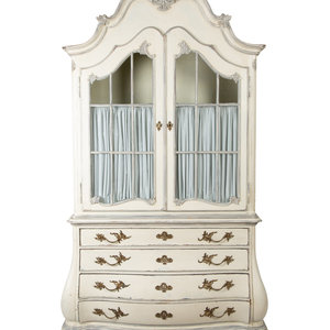 Appraisal: A French Provincial Blue and White Painted Armoire with Bombe