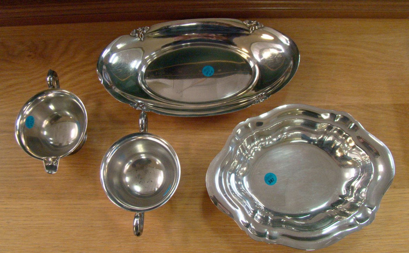 Appraisal: FOUR STERLING SILVER HOLLOWWARE PIECES By various makers Includes a