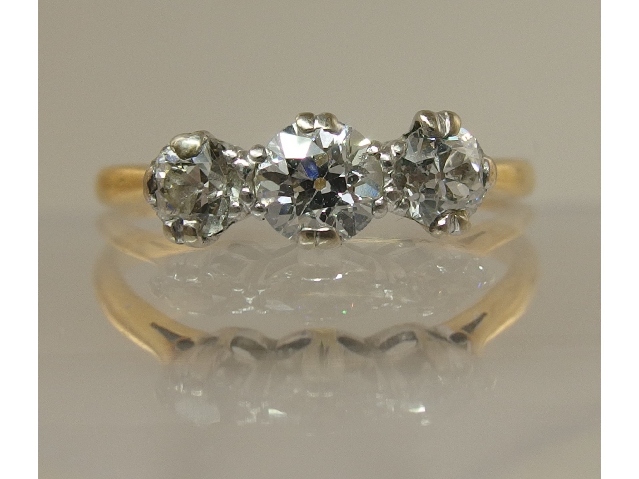 Appraisal: An ct three stone old cut diamond ringof approx cts