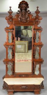 Appraisal: Large Victorian walnut hall mirror with carved shell over bust