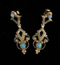 Appraisal: A Pair of Yellow Gold Earrings Set With Opals A