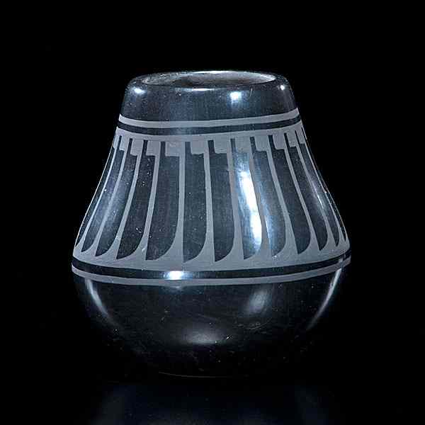 Appraisal: Blue Corn San Ildefonso Blackware Jar potted with tapering body