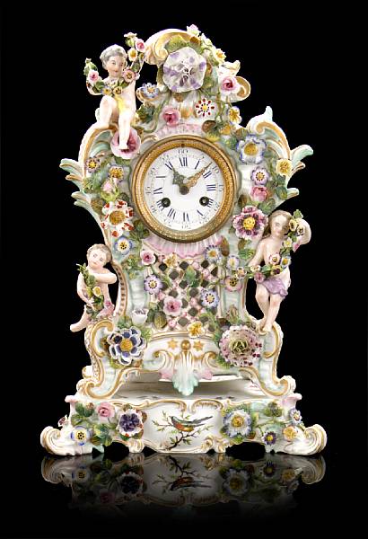 Appraisal: A Meissen style porcelain floral encrusted mantel clock early th