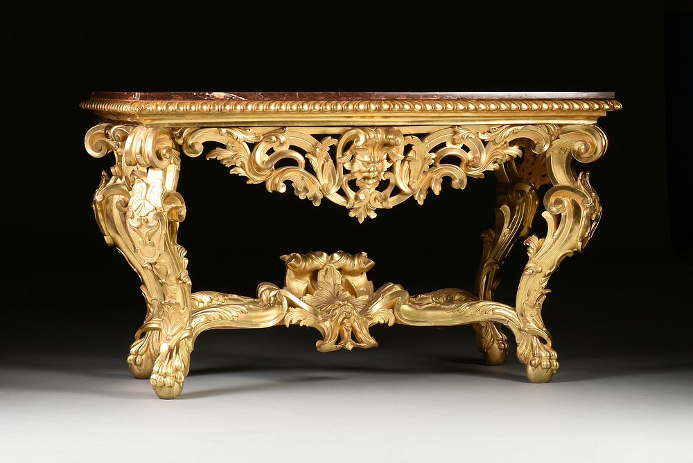 Appraisal: A GRAND ROCOCO REVIVAL MARBLE TOPPED AND PARCEL GILT CARVED