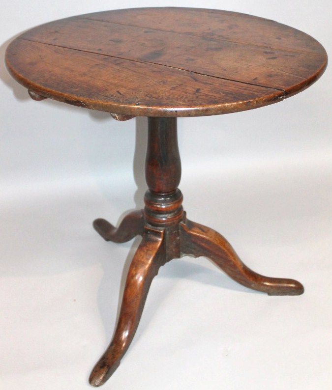 Appraisal: An thC oak country table the plain circular plank top