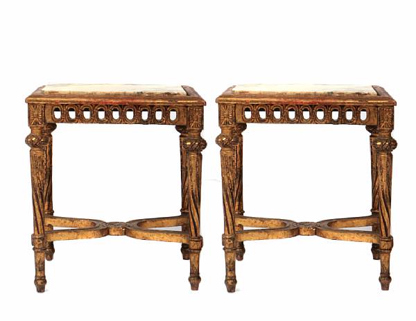 Appraisal: A pair of Italian rectangular carved and gilded tables with