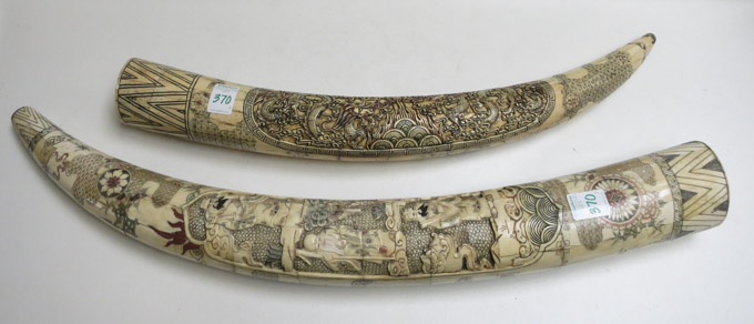 Appraisal: TWO CHINESE CARVED BONE TUSKS Lengths and inches