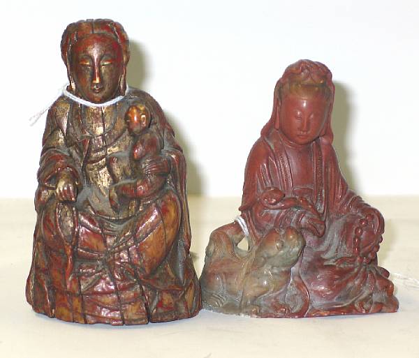 Appraisal: Two seated figures of Guanyin One of soapstone portraying the