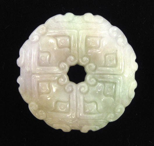 Appraisal: CHINESE CARVED JADE PENDANT The light green and lavender jade