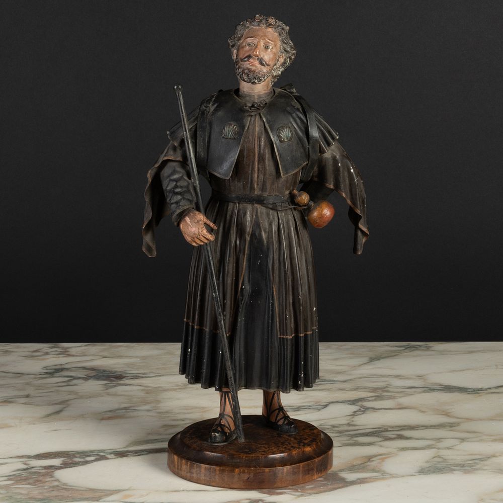 Appraisal: Spanish Painted T le Figure of a Pilgrim With scallops