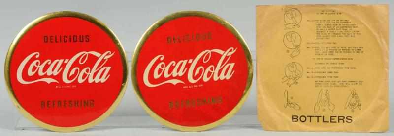 Appraisal: Pair of Coca-Cola Celluloid Discs with Envelope One exhibits light