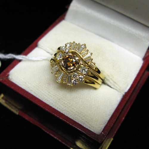 Appraisal: A DIAMOND FOURTEEN KARAT AND EIGHTEEN KARAT GOLD THREE-PART RING