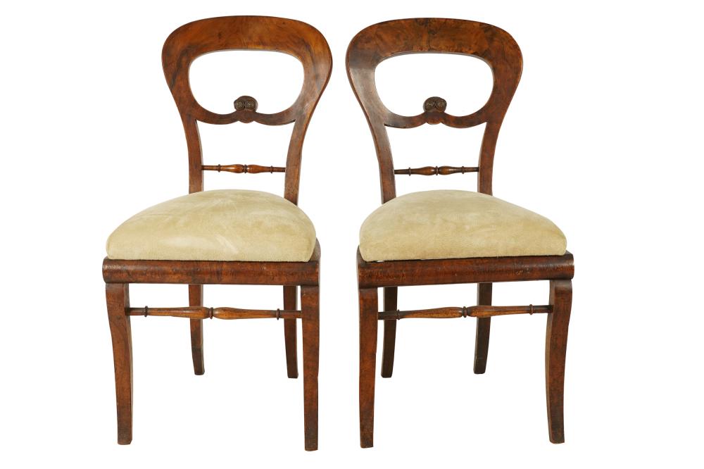 Appraisal: PAIR OF VICTORIAN MAHOGANY BALLOON CHAIRSwith applied rosettes centering the