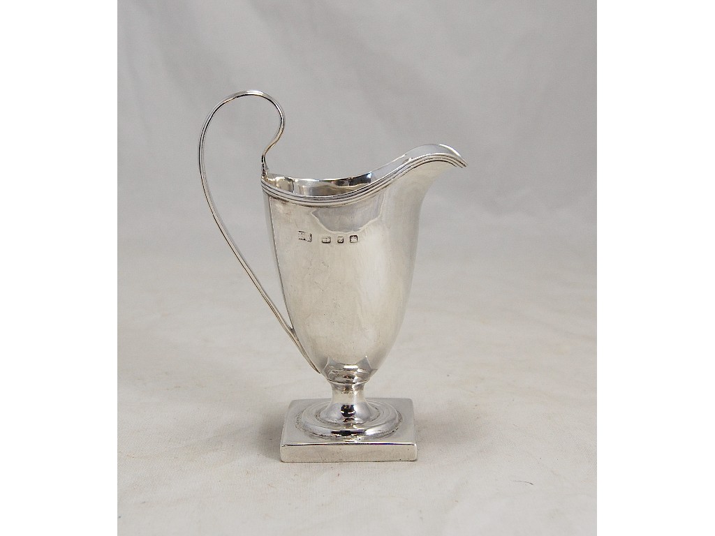 Appraisal: Victorian silver helmet jug on square base with reeded border