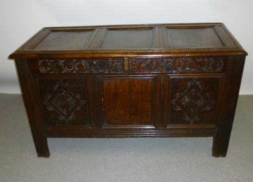 Appraisal: AN OAK PANELLED COFFER late th century with moulded edged