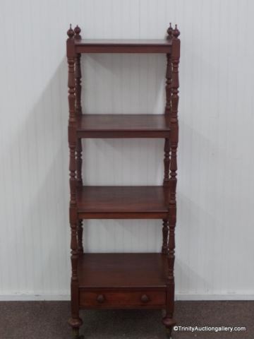 Appraisal: Vintage Mahogany Open Display Shelf on Casters This s for