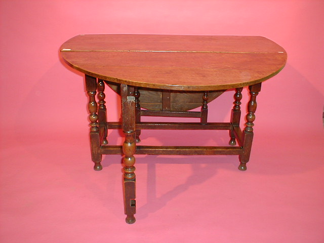 Appraisal: A thC and later oak gateleg dining table