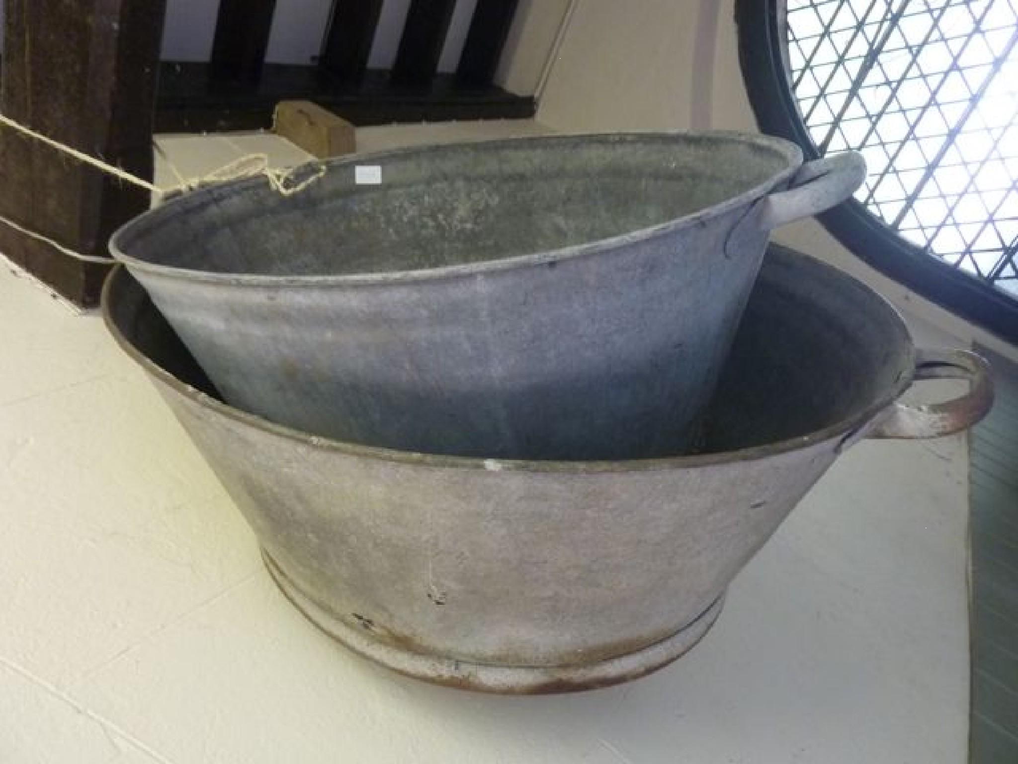 Appraisal: Two vintage galvanised baths of varying size