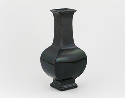 Appraisal: A Chinese square-section vase decorated with a deep purplish aubergine