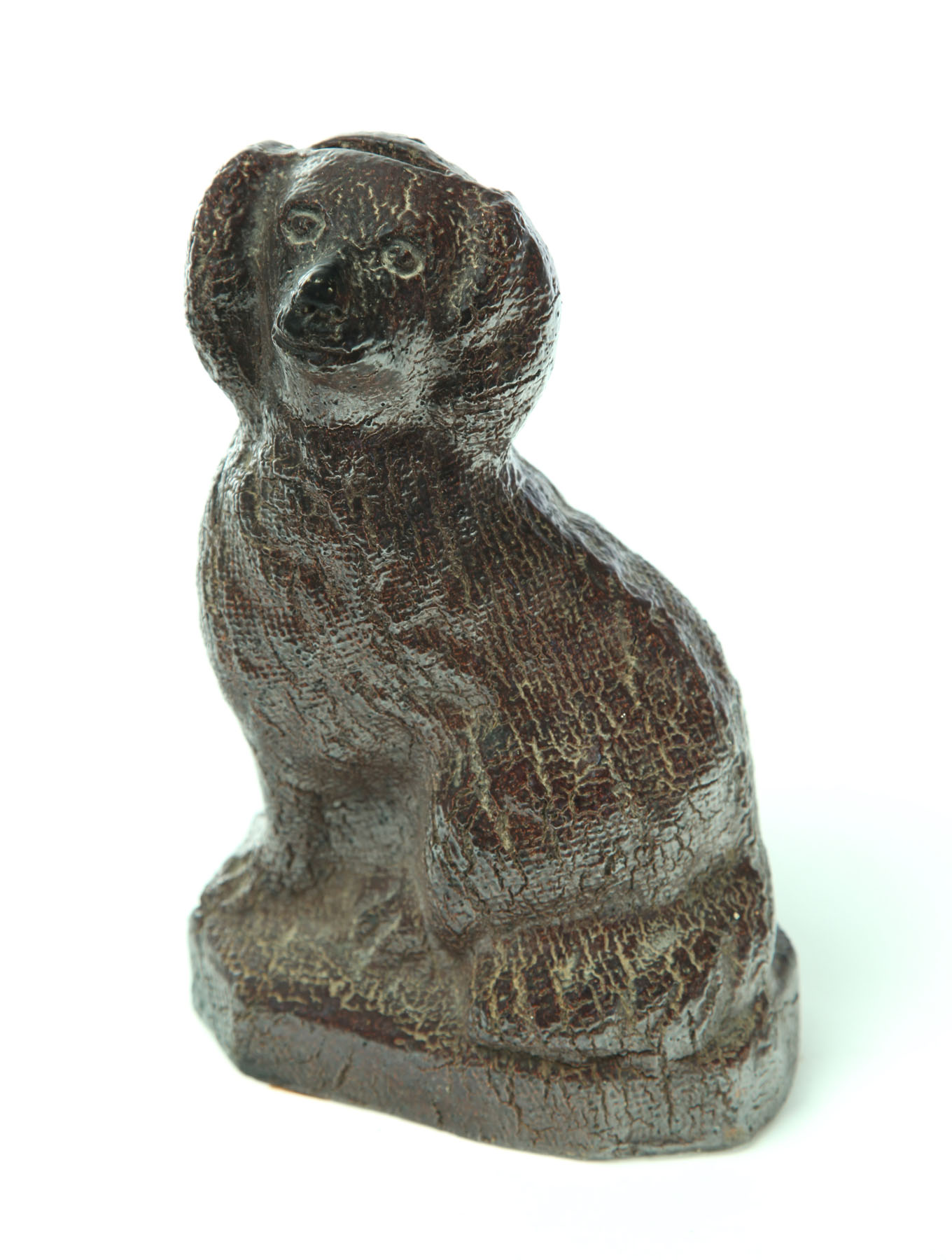 Appraisal: SEWERTILE DOG BANK Midwest early th century Seated Staffordshire-style spaniel