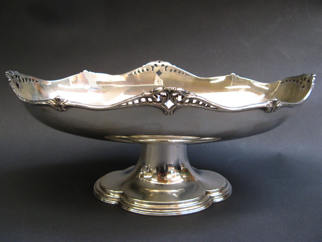 Appraisal: ENGLISH STERLING SILVER HALLMARKED COMPOTE Sheffield oval form having pierced