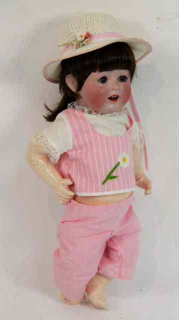 Appraisal: A German bisque headed baby doll with blue eyes cm