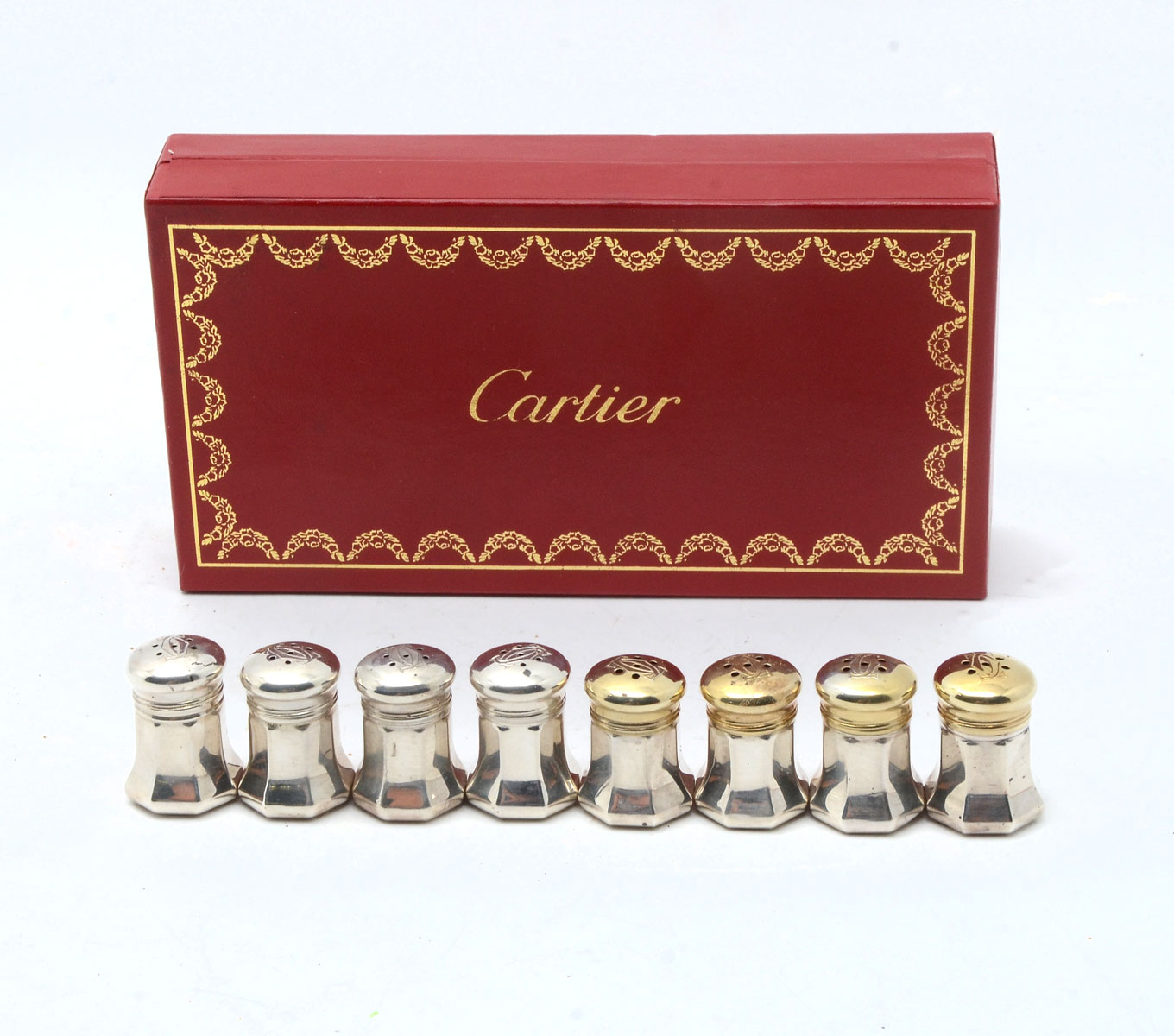 Appraisal: CARTIER STERLING SALT PEPPER SHAKERS Individual miniature silver salt and