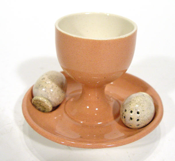 Appraisal: Pink glazed early Moorcroft Pottery eggcup inset with two speckled