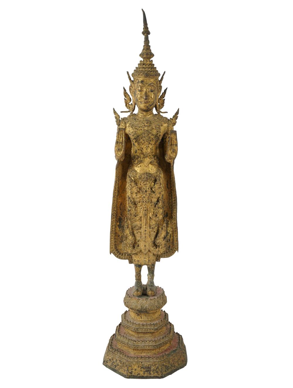 Appraisal: THAI GILT BRONZE BUDDHAmodeled standing with palms raised Condition overall