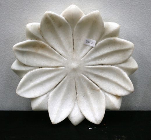 Appraisal: A small white marble bowl carved as a Lotus Rajasthan