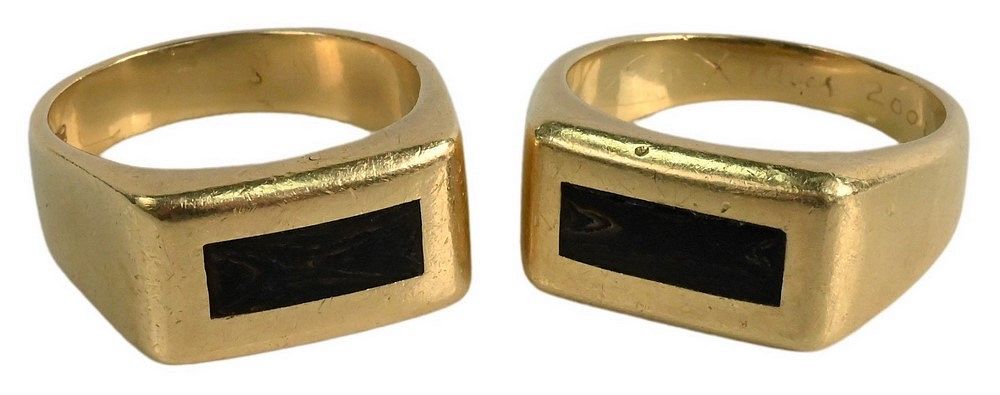 Appraisal: Two Karat Gold Rings both having center wooden insets total