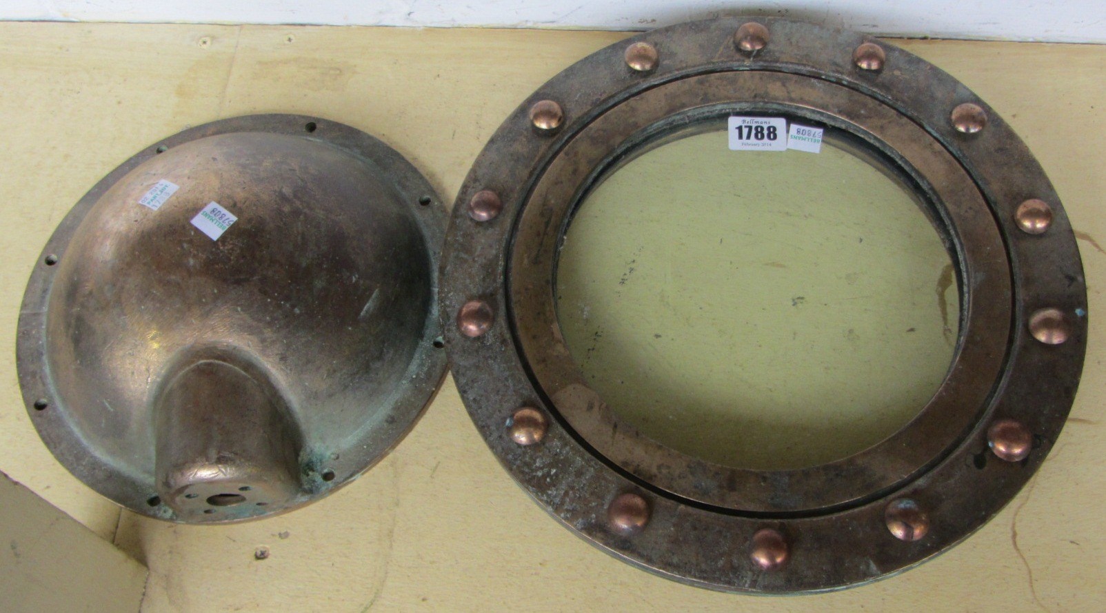 Appraisal: A brass ships exterior circular port hole light with convex