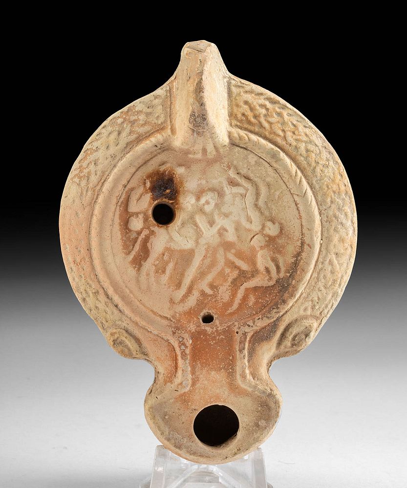 Appraisal: Roman Pottery Oil Lamp w Bullfighting Scene First Time At