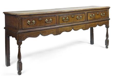 Appraisal: GEORGE III OAK DRESSER BASE CIRCA the moulded rectangular plank