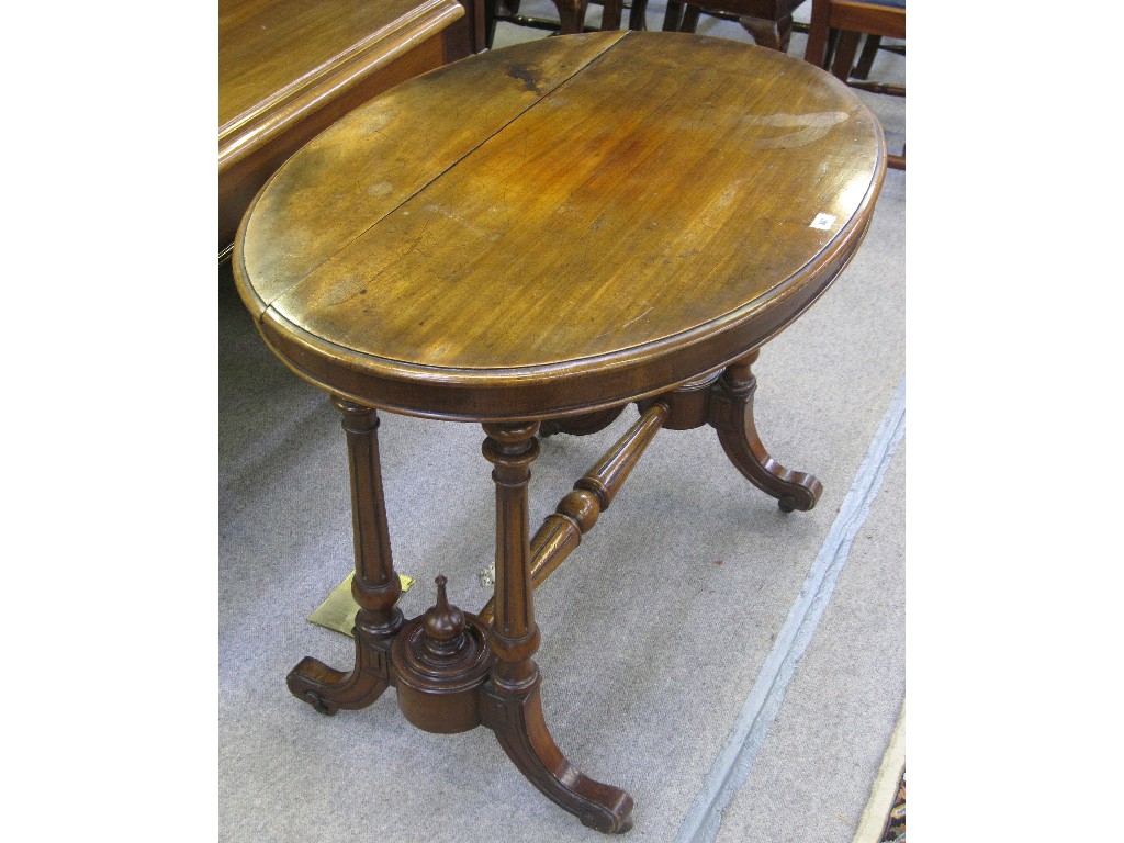 Appraisal: Victorian oval mahogany centre table on reeded supports split top