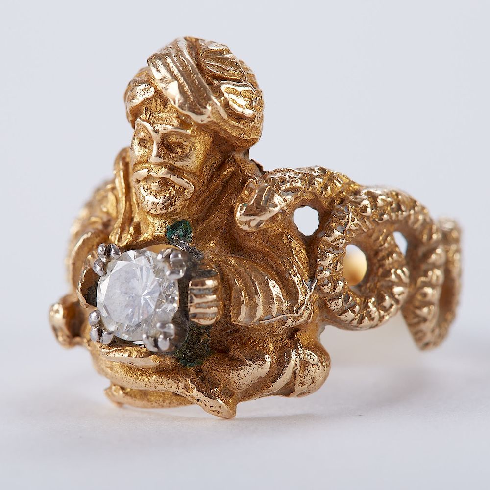 Appraisal: Diamond Ring with Man and Snake K gold ring modeled