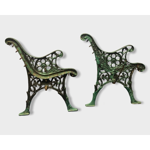 Appraisal: A pair of painted green cast iron bench ends