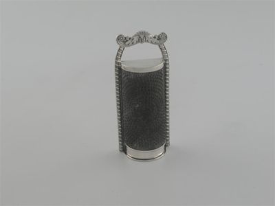 Appraisal: A George III kitchen nutmeg grater with a gadrooned border