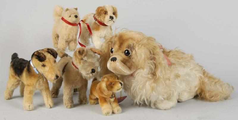 Appraisal: Lot of Vintage Steiff Mohair Animals Description Curly-haired dog with