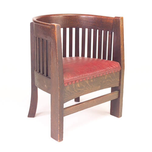 Appraisal: PLAIL BROS Barrel-back armchair with slats to seat tapered front