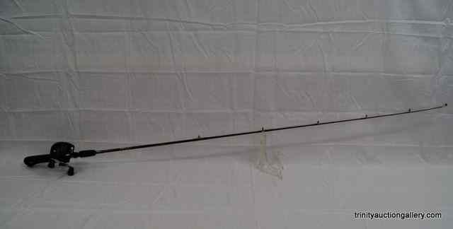 Appraisal: Shakespeare Alphy SS Fishing Reel Rod ComdoIncludes the Shakespeare Alpha