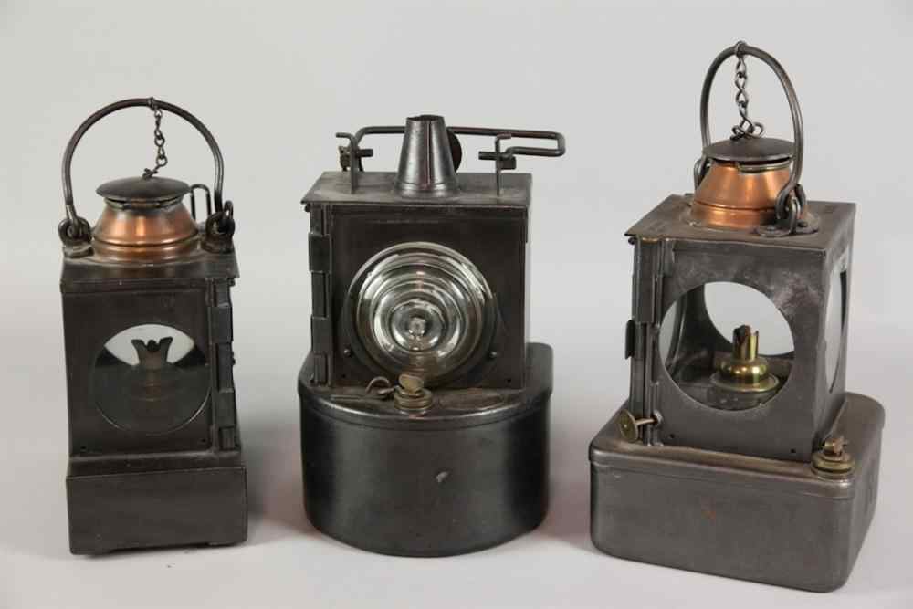 Appraisal: THREE BRITISH LAMP MANUFACTURING RAILWAY SUPPLIES LTD RAILWAY LANTERNS Of