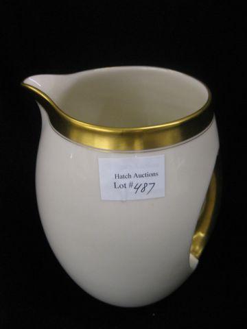 Appraisal: Lenox Porcelain Pitcher indented handle gold trim excellent