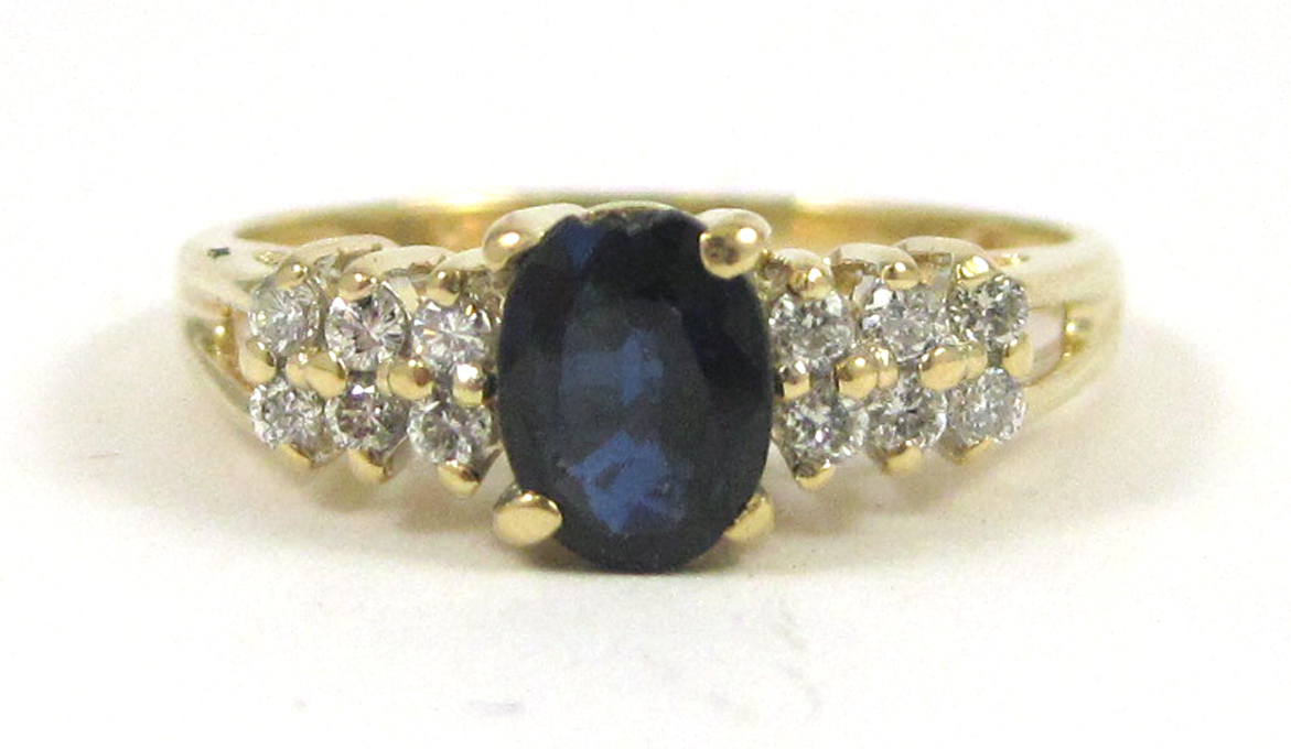 Appraisal: SAPPHIRE DIAMOND AND FOURTEEN KARAT GOLD RING with six round-cut