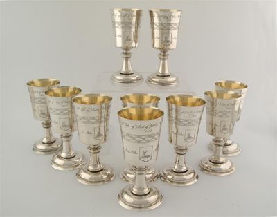 Appraisal: Ten modern commemorative chalices with a geometric design around the