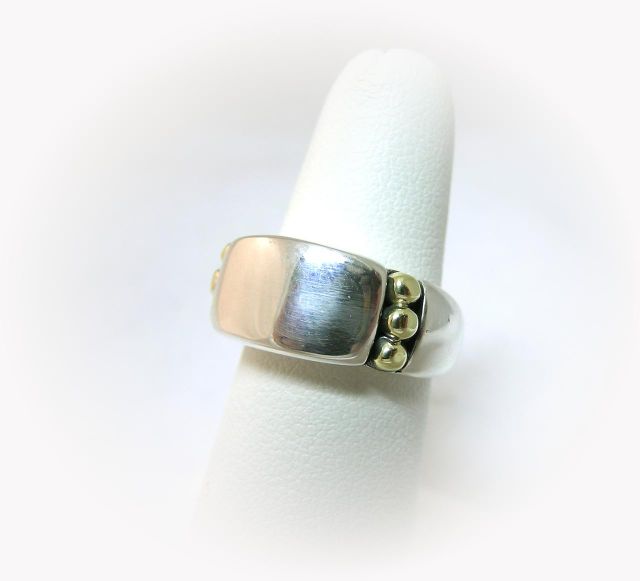 Appraisal: Lagos Caviar designer lady's sterling and K yellow gold ring