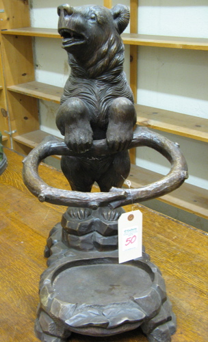 Appraisal: FIGURAL BRONZE UMBRELLA CANE STAND the figure of a grizzly