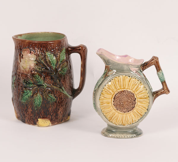 Appraisal: Lot of Majolica pitchers sunflower pattern with raised center medallions